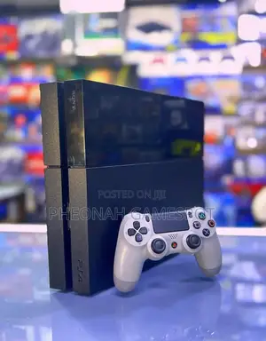 Pre-Owned Ps4 Console, Loaded With 13 Games Two Controllers!