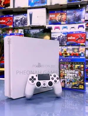 Pre-Owned Ps4 Slim Console, Loaded With 13 Games, Two Controllers!