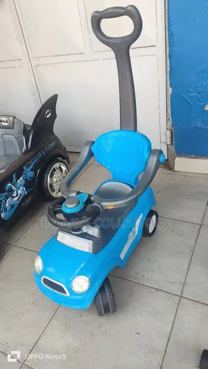 Uk Used Blue Baby Push Car With a Parental Handle.