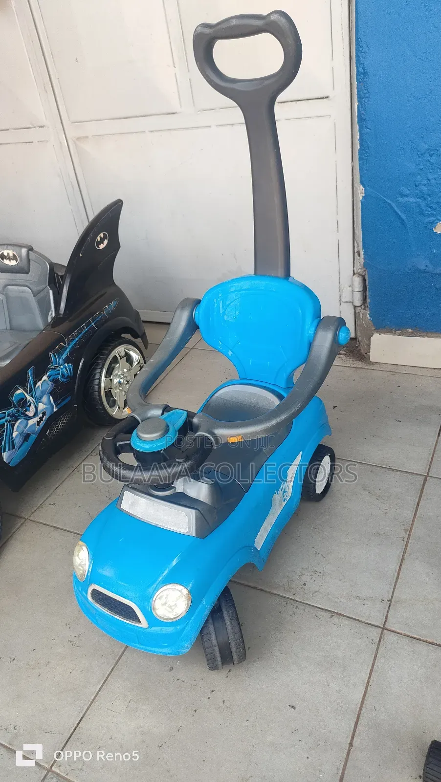 Uk Used Blue Baby Push Car With a Parental Handle.