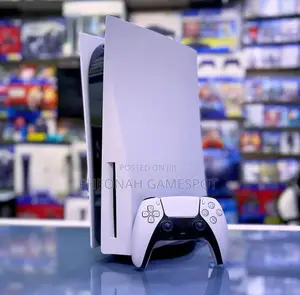 This Playstation 5 Standard Comes With 2 Controllers and 2 Games. Used