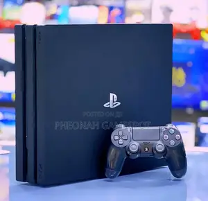 Playstation 4 Pro. 1tb, Comes With 6 Months Warranty, 25 Games, 2 Pads