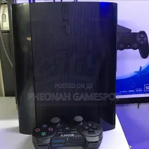 Playstation 3 Super Slim. The Whole Kit - 13 Games, 2 Controllers