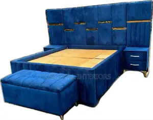 A Navy Blue Bed With a Automan