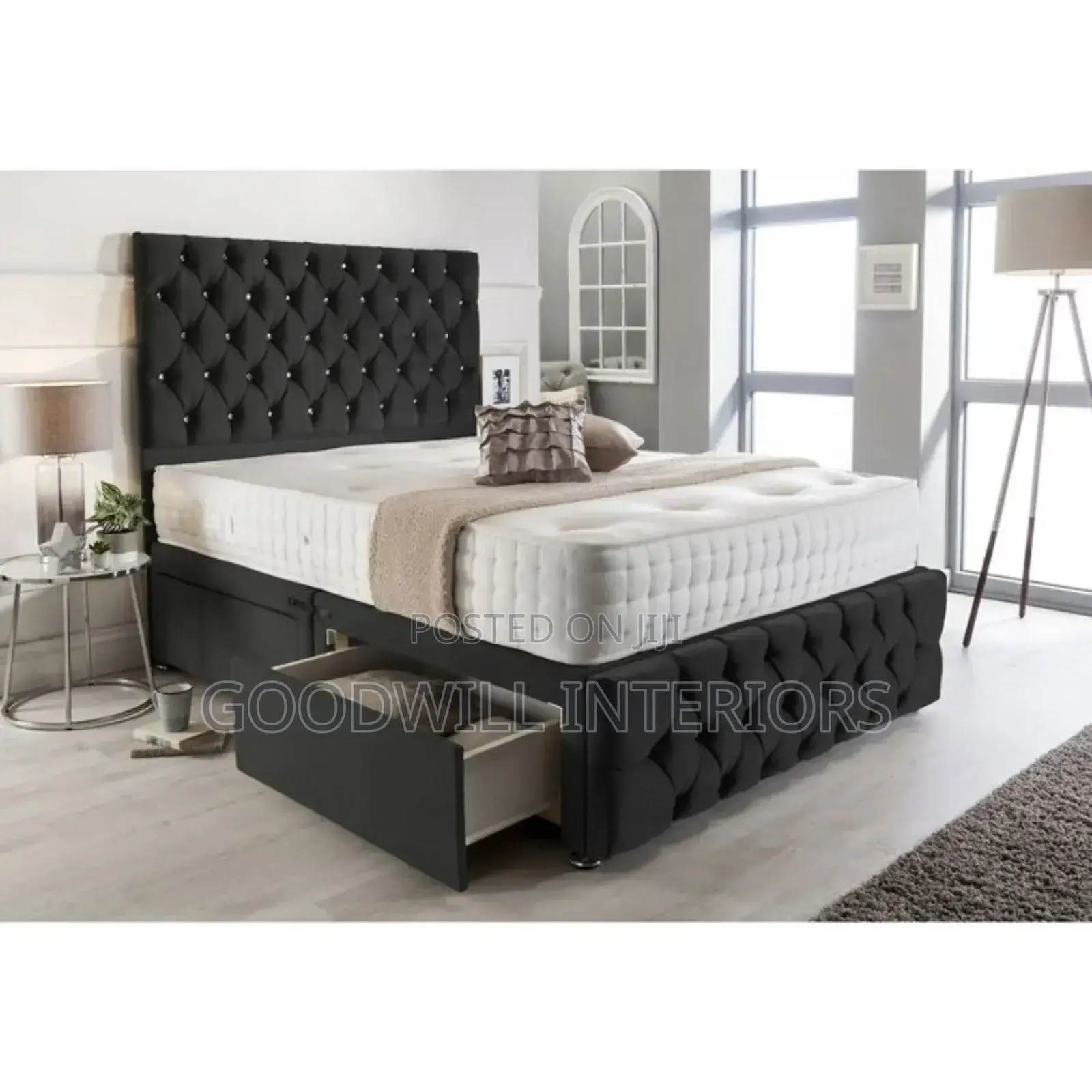 A Dark Gray  Bed With Two Storage Drawers