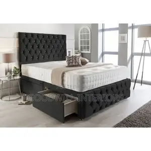 A Dark Gray  Bed With Two Storage Drawers