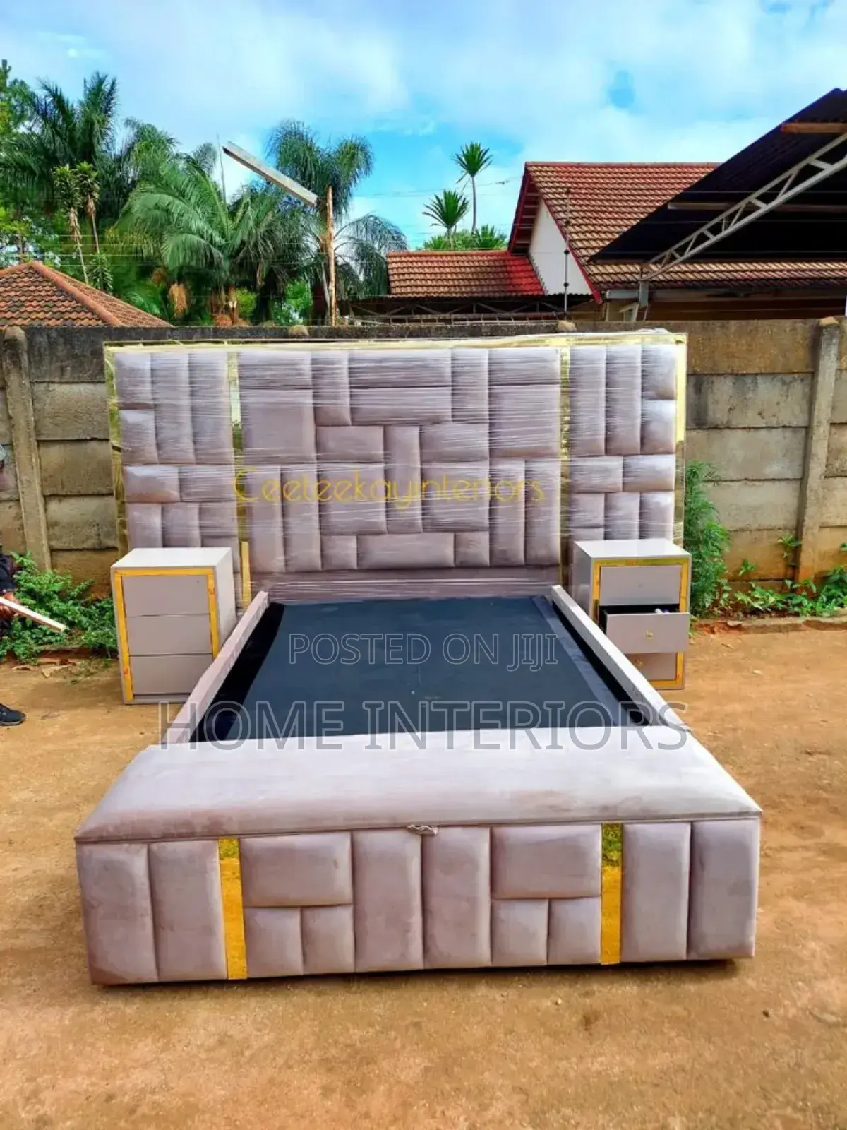 A Bed With Two Storage Drawers and a Automan