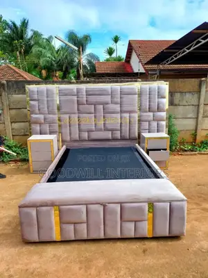 A Bed With Two Storage Drawers and a Automan