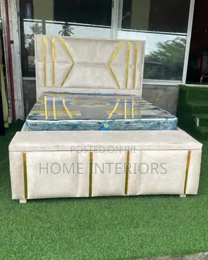 A Bed With a Mattress and Automan