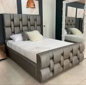 A Dark Gray Colored Bed