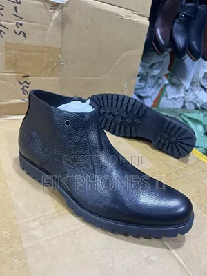 This Is a Tamer Tanca Men's Black Genuine Leather Casual Boot.