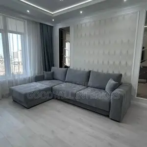A Six Seater Gray Colored Sofa Set