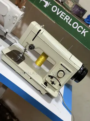Zigzag Design Sewing Machines With Manual Local Stand Warranty Given