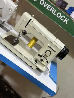 Zigzag Design Sewing Machines With Manual Local Stand Warranty Given