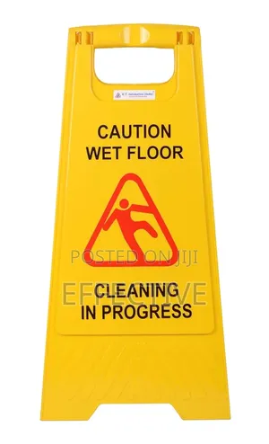 Yellow Board With Massage Of Caution Wet Floor Signs