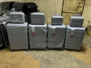 Brand New Sets of Classic Rubber Suitcases