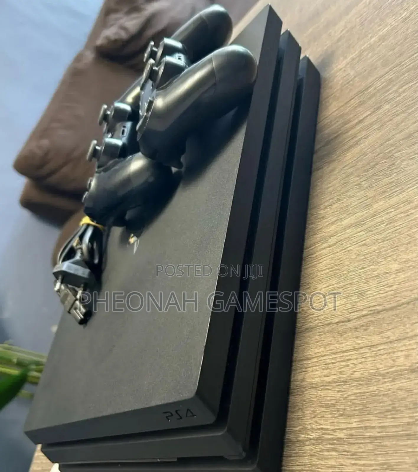 Elite Ps4 Pro Console. It's Chipped, Comes With 25 Games and 2 Pads