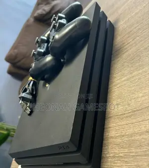 Elite Ps4 Pro Console. It's Chipped, Comes With 25 Games and 2 Pads