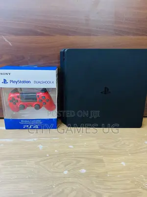 Playstation 4 Slim + One Controller:-