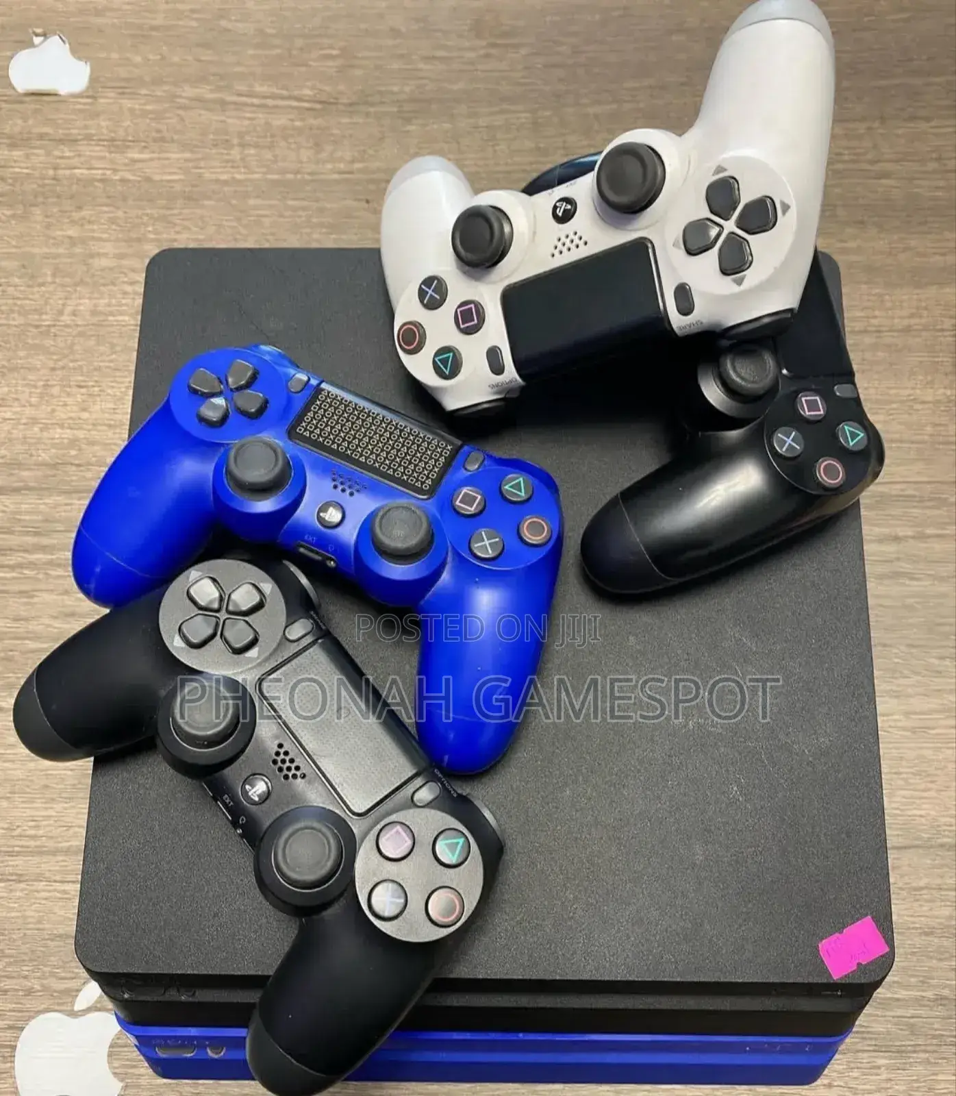 The Cheapest Playstation 4 Slim Bundle on Jiji. 13 Games and 2 Pads