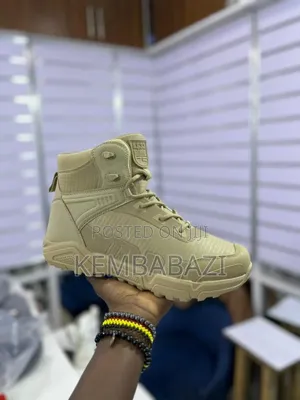 Men's Waterproof Hiking Tactical Boots in a Tan Color.