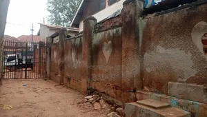 Land On Salama Road With Rental Shops And House On Sale