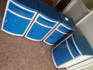 A Set of Four Plastic Patient Bedside Lockers