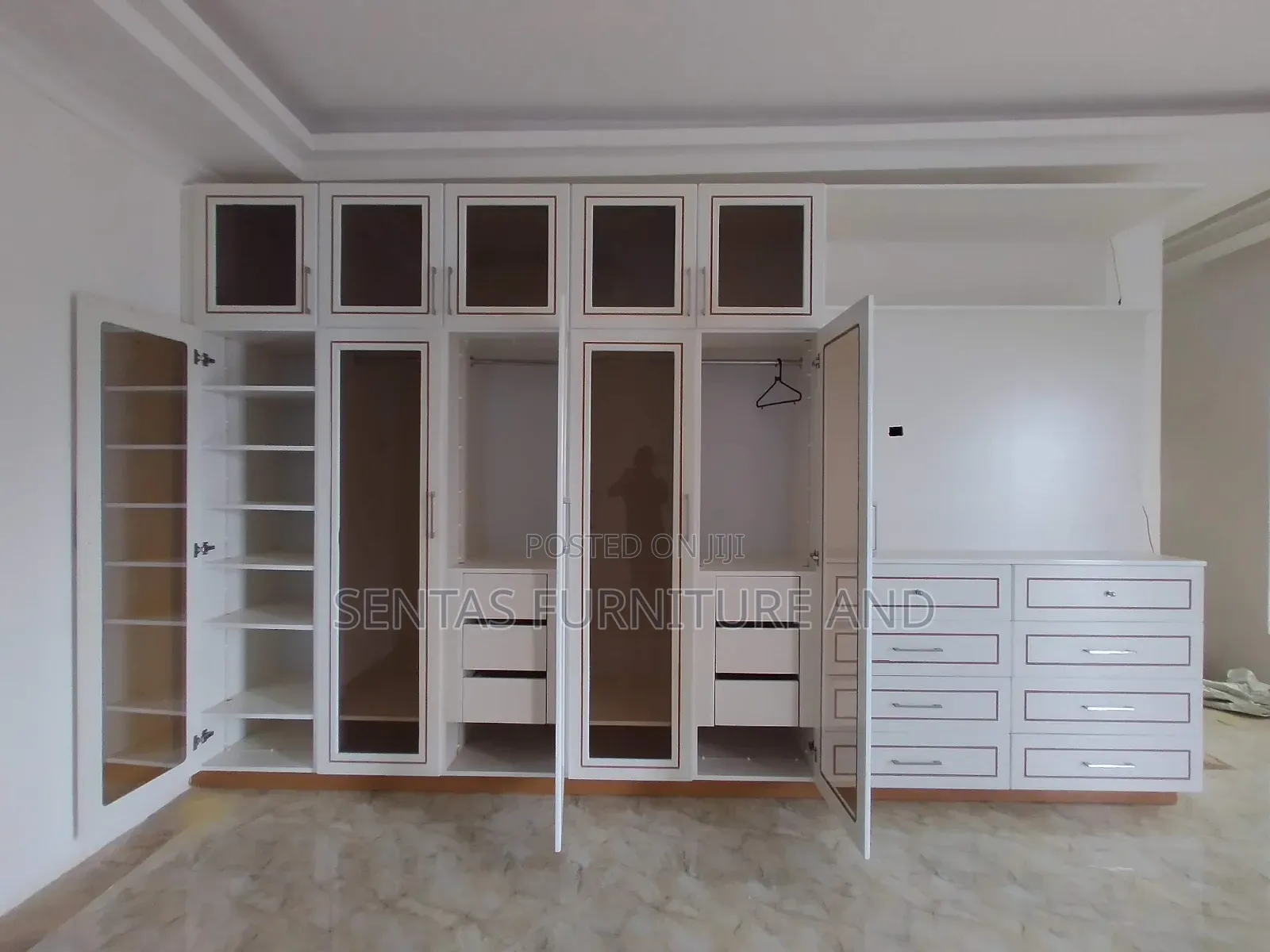 Luxury Wardrobes Installation With Glass Shutters