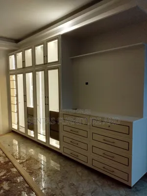 Luxury Wardrobes Installation With Glass Shutters