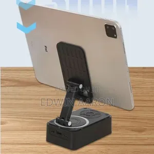 Multi-Functional Phone Stand With Speaker and Clock Display