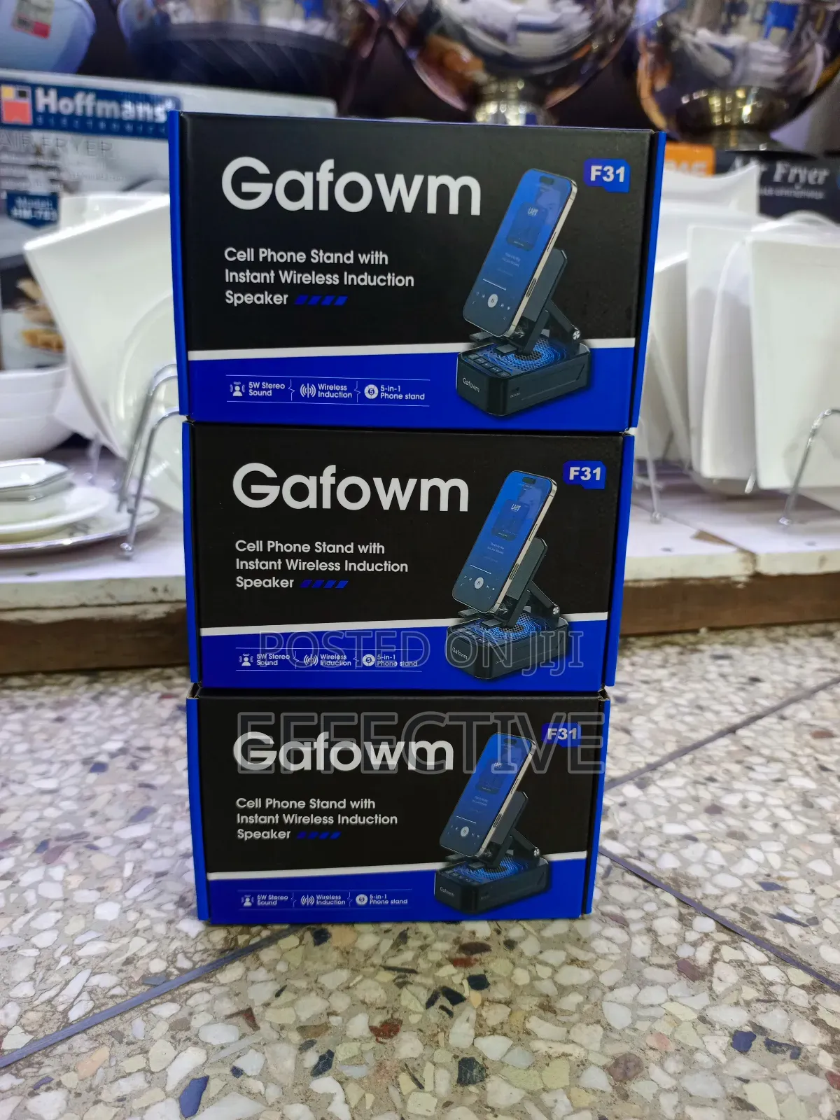 Cell Phone Stand With Instant Wireless Induction Speaker.