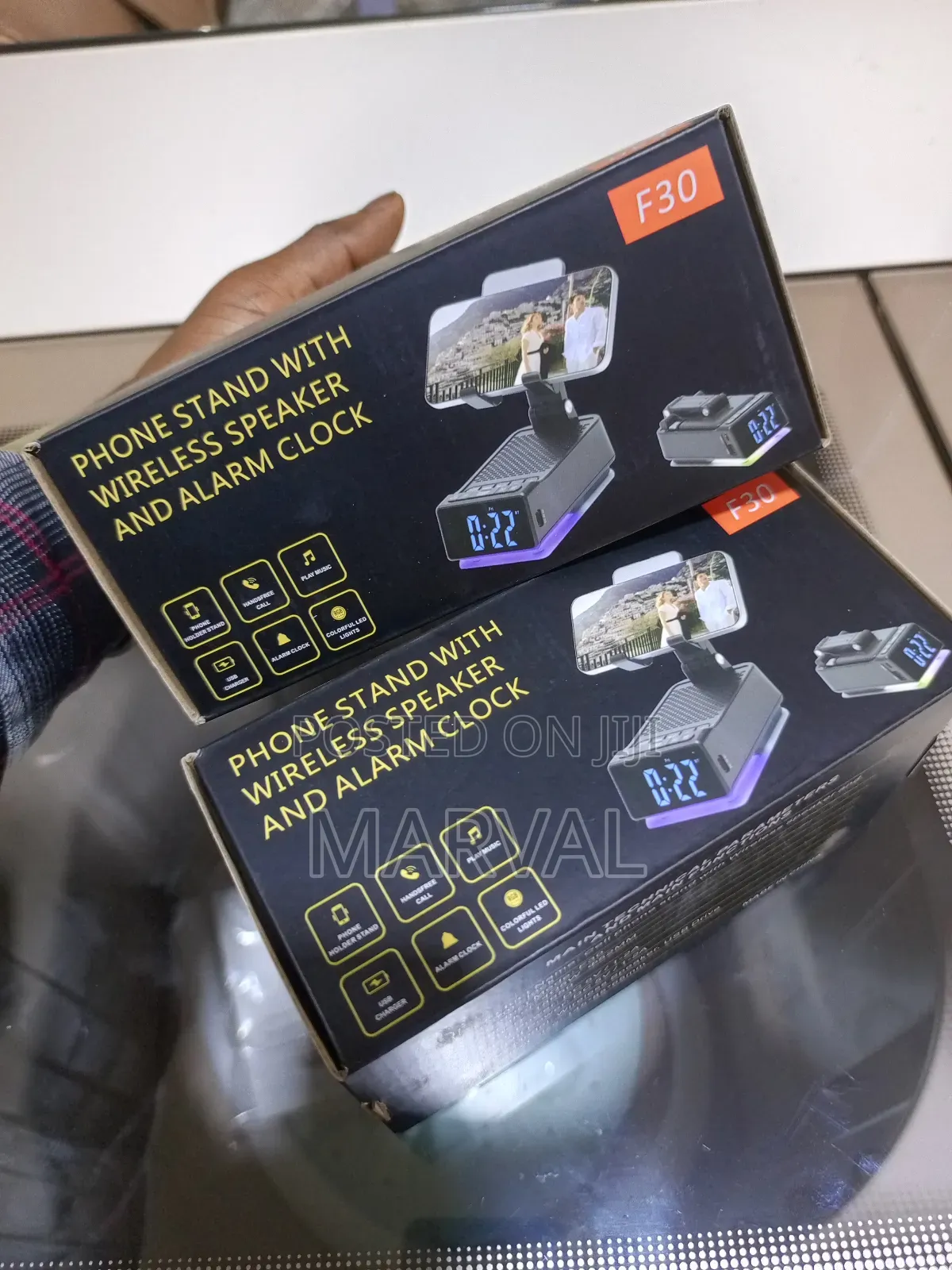 F30 Phone Stand With Wireless Speaker and Alarm Clock.