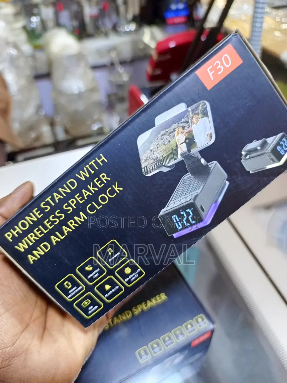 F30 Phone Stand With Wireless Speaker and Alarm Clock.