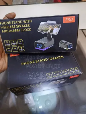 F30 Phone Stand With Wireless Speaker and Alarm Clock.