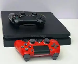 Clean Playstation 4 Slim. Its Full Set. With 2 Controllers, 14 Games