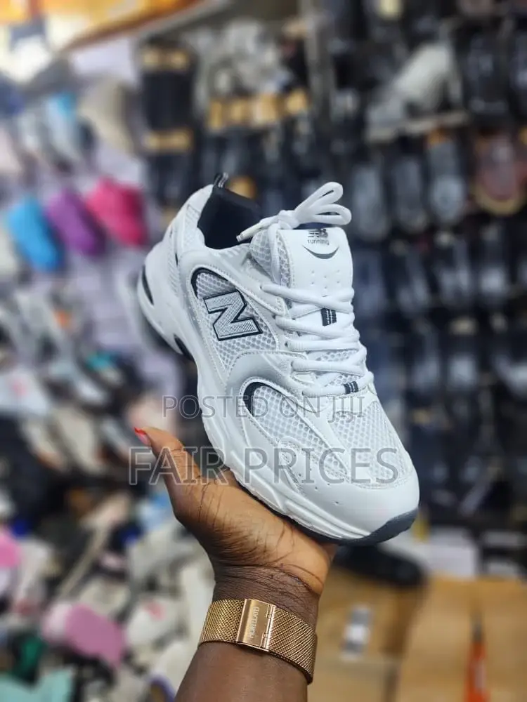 Men’S and Women’S New Balance Sneakers
