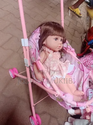 Rubber Doll and Stroller Combo