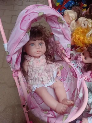 Rubber Doll and Stroller Combo