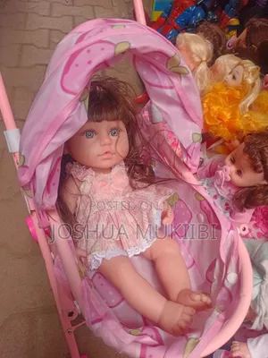Rubber Doll and Stroller Combo