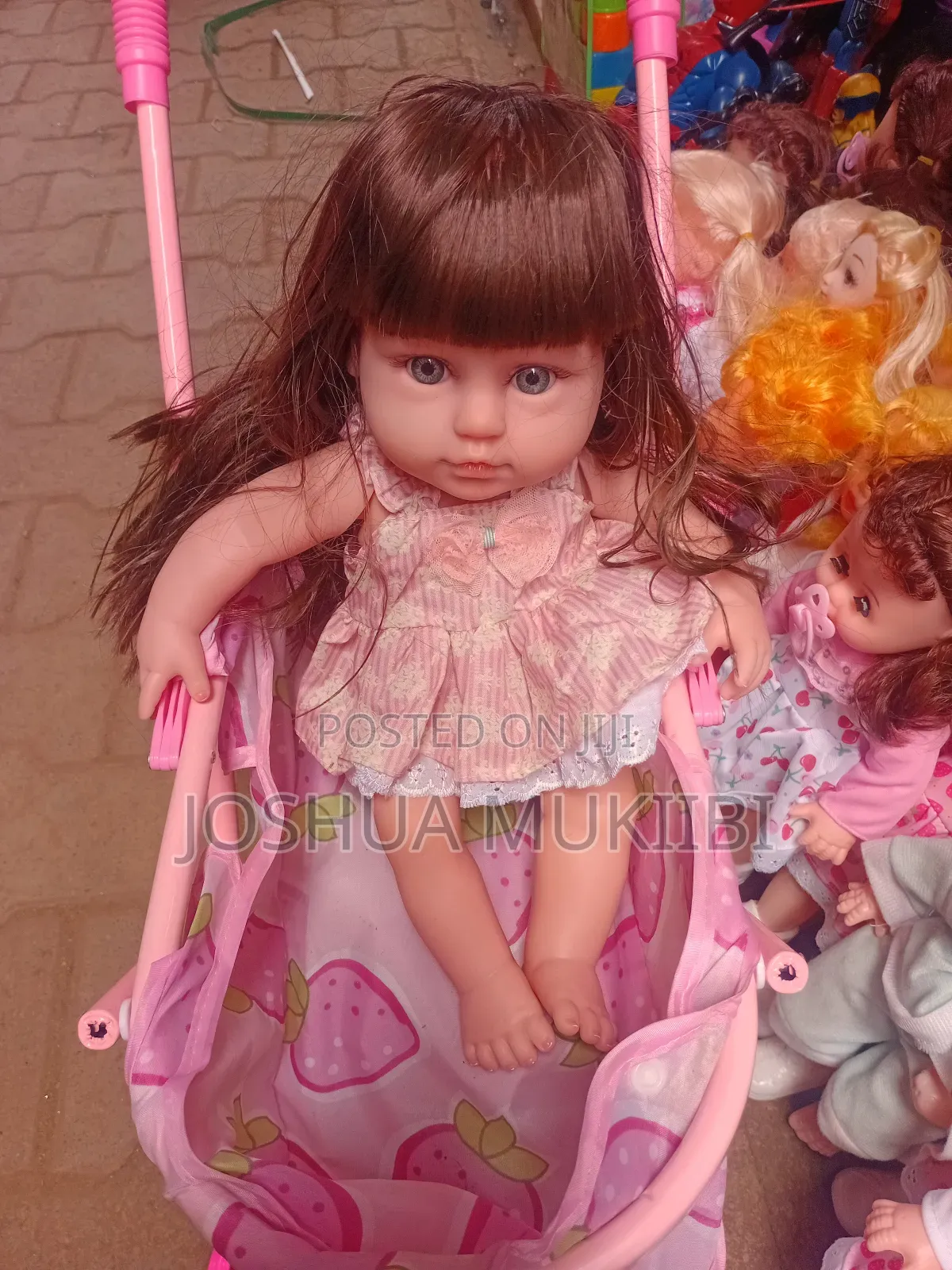 Rubber Doll and Stroller Combo