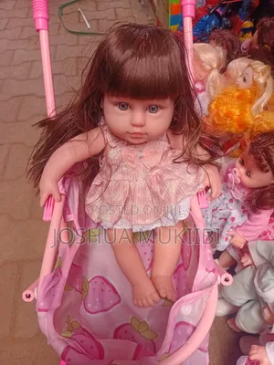 Rubber Doll and Stroller Combo