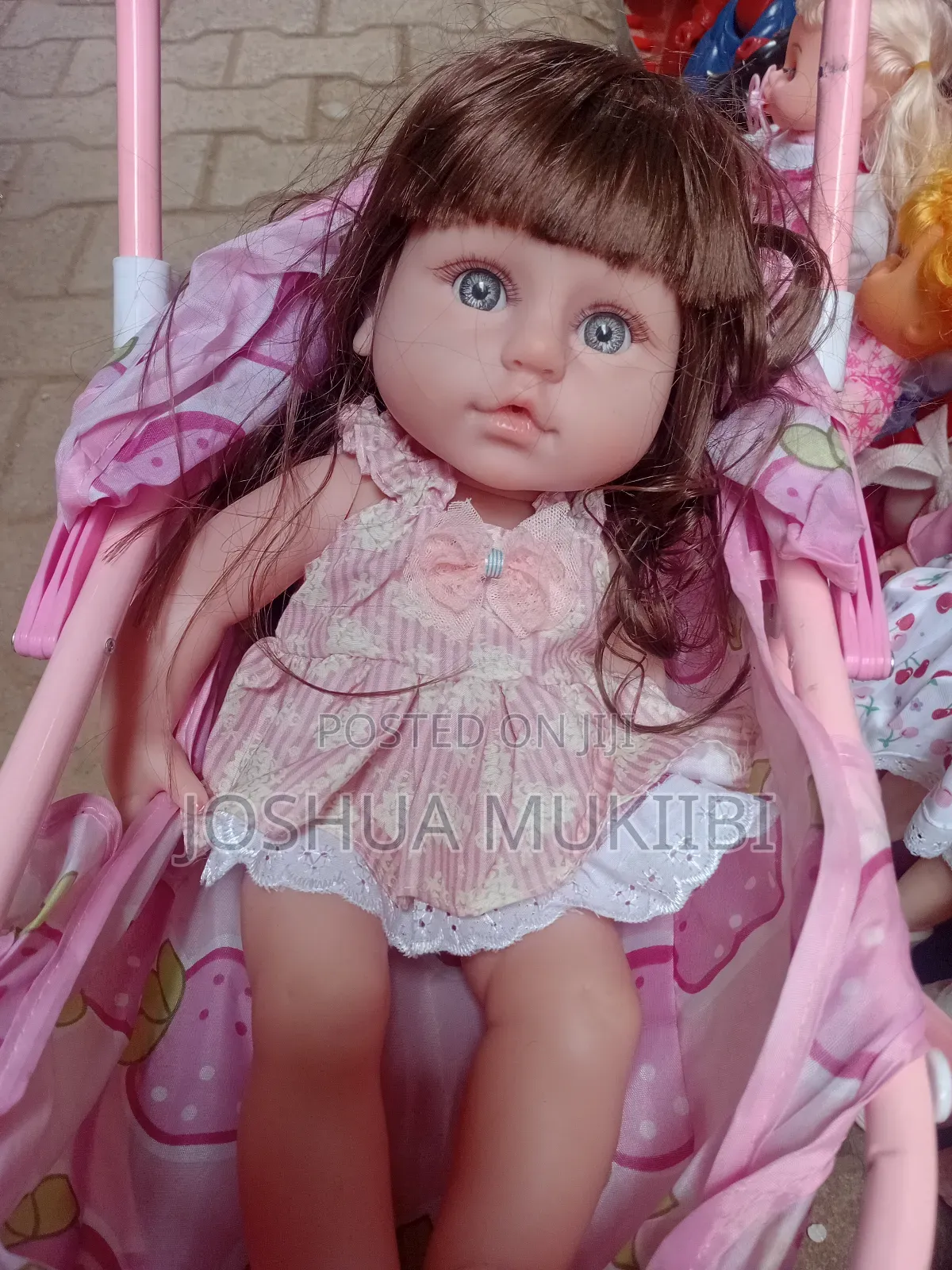 Rubber Doll and Stroller Combo