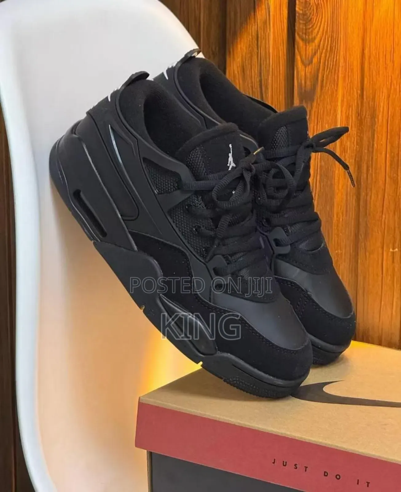 Nike Air Jordan 4 Rm "Black Cat" Sneakers.