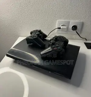 Used Ps3 Super Slim With 15 Games and Two Controllers - Full Kit.