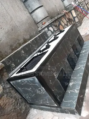 Energy Saving Stove for Firewood and Charcoal With a Grill