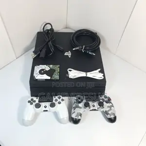 Ps4 Pro With 2 White Controllers