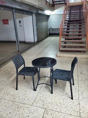 L15 Round Dining Glass Table and Plastic Chairs