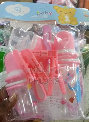 Baby Bottles With Pegs and Washing Brush
