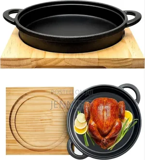 Cast Iron Sizzler Pan With a Wooden Serving Board