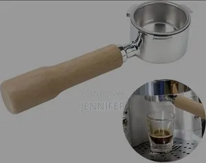 Coffee Portafilter With a Wooden Handle.